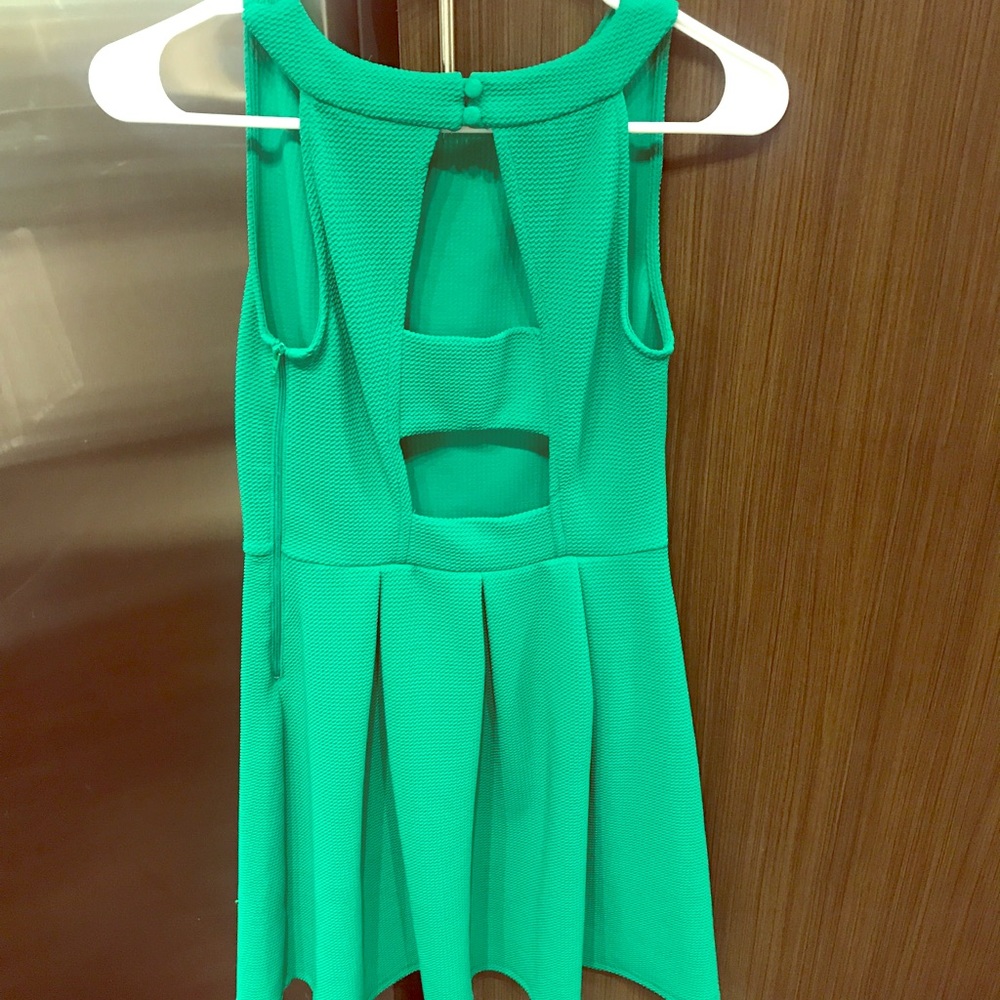 Green, open back peplum dress!